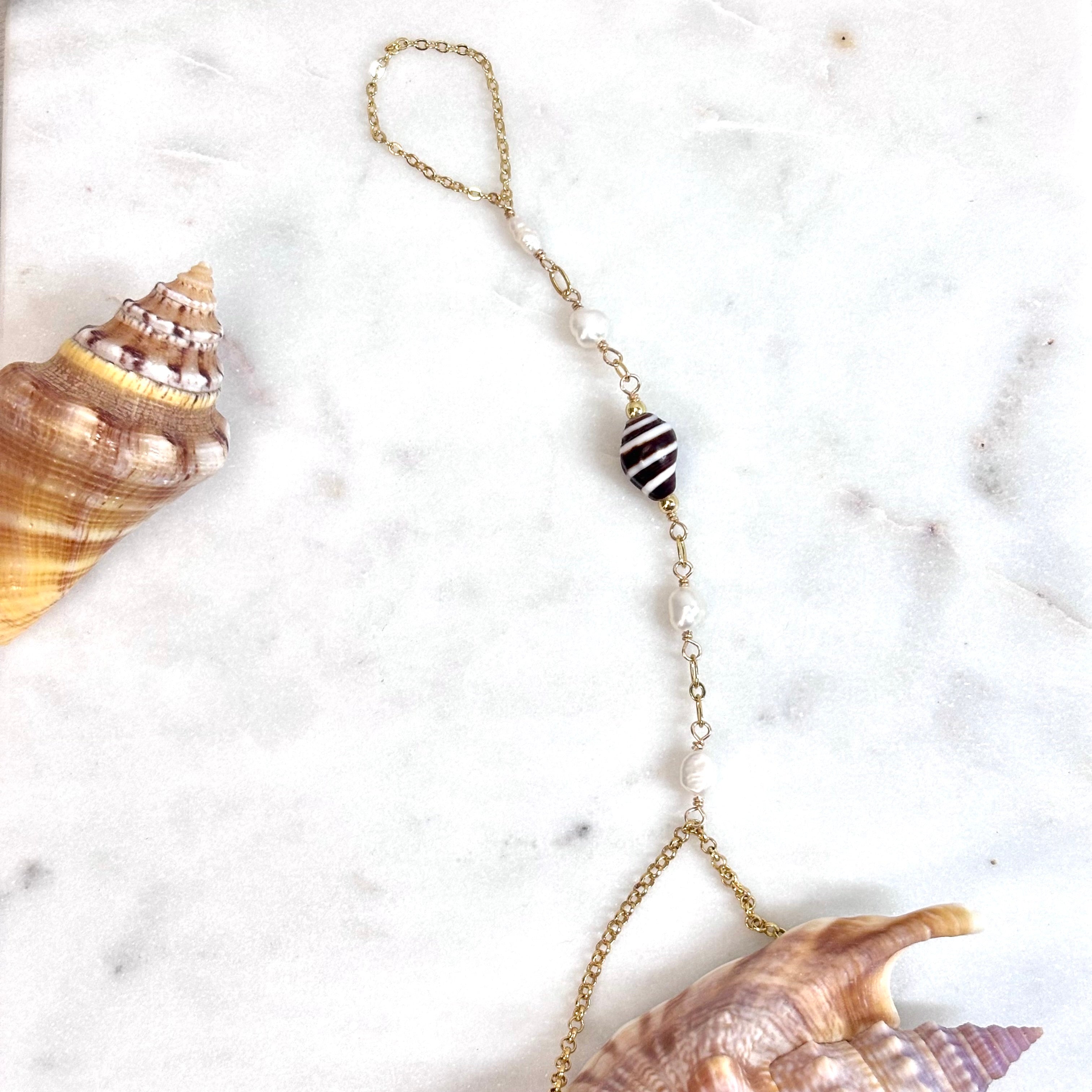 Bumblebee shell handchain w/ white pearls