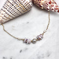 Light gray pearl Necklace w/ puka shells