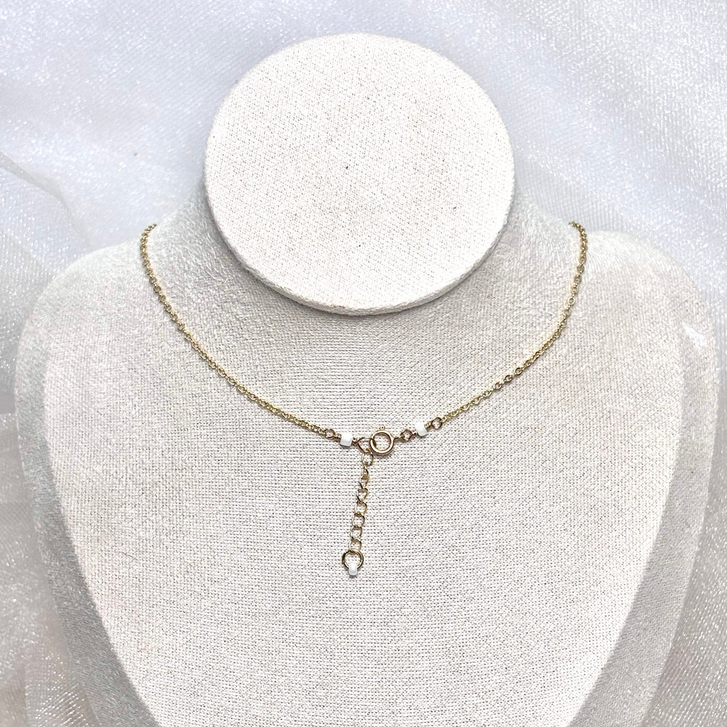 Light gray pearl Necklace w/ puka shells