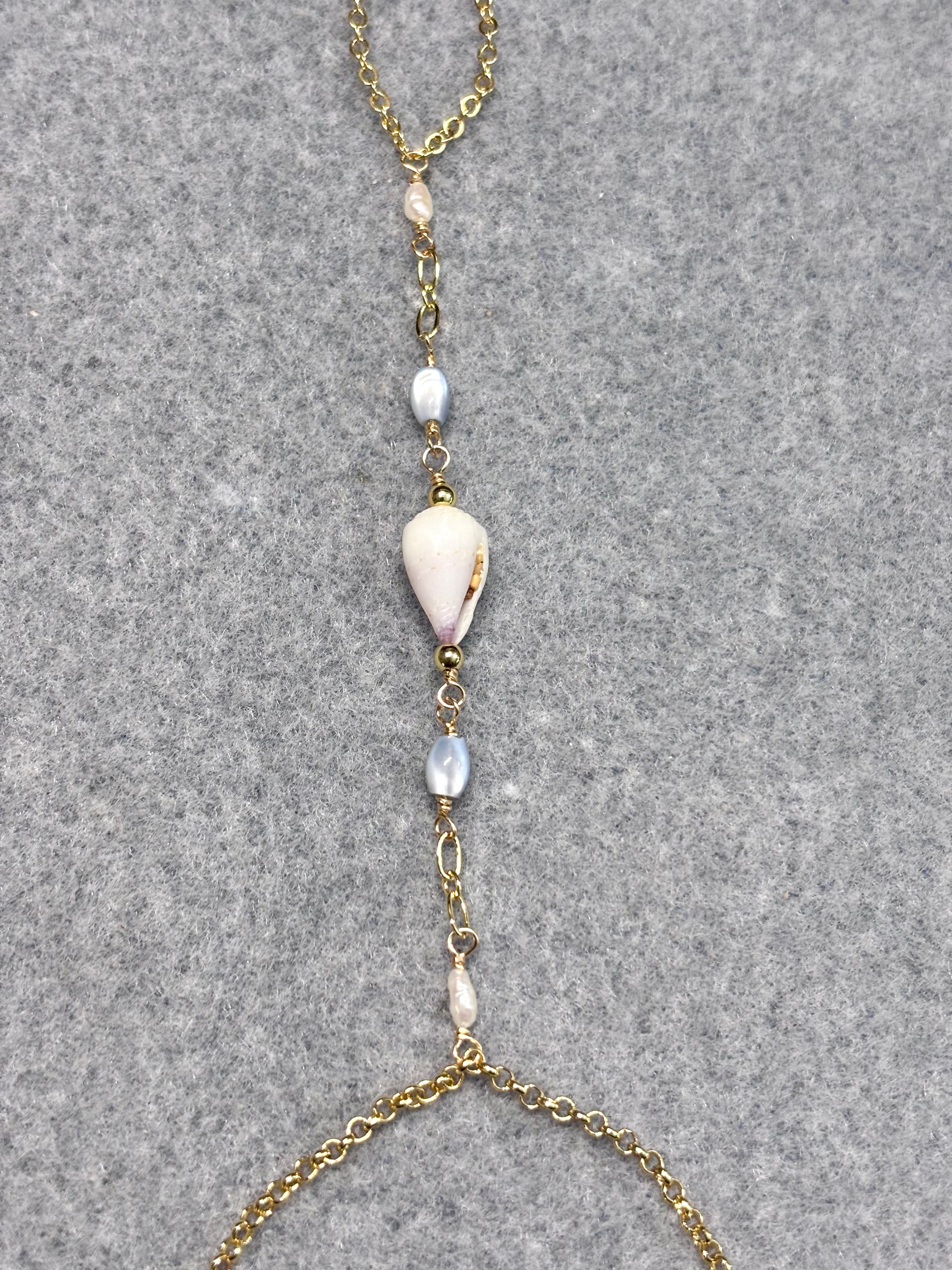 Cone shell handchain w/ white pearls and natural blue beads