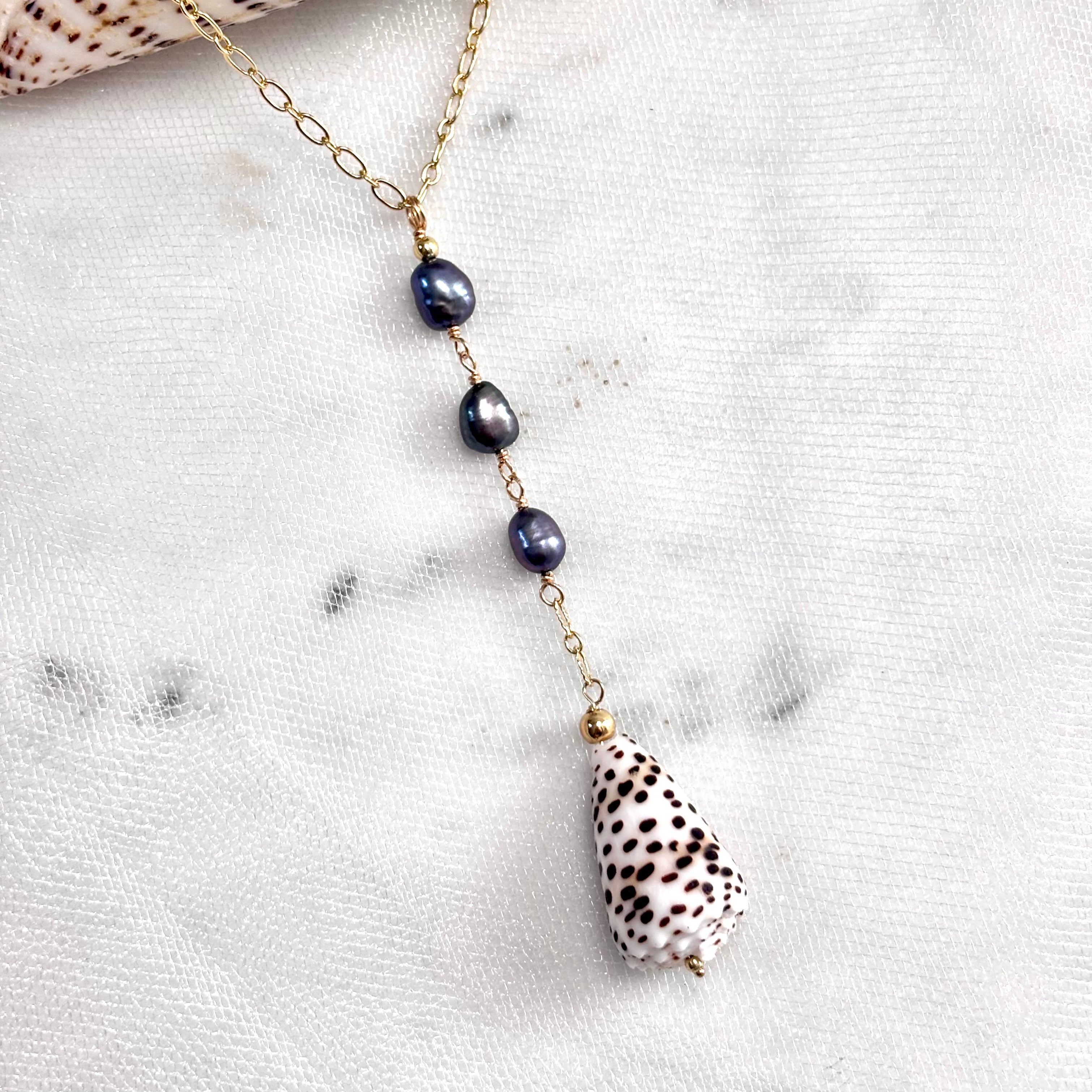 Flea cone shell Necklace w/ dark pearls