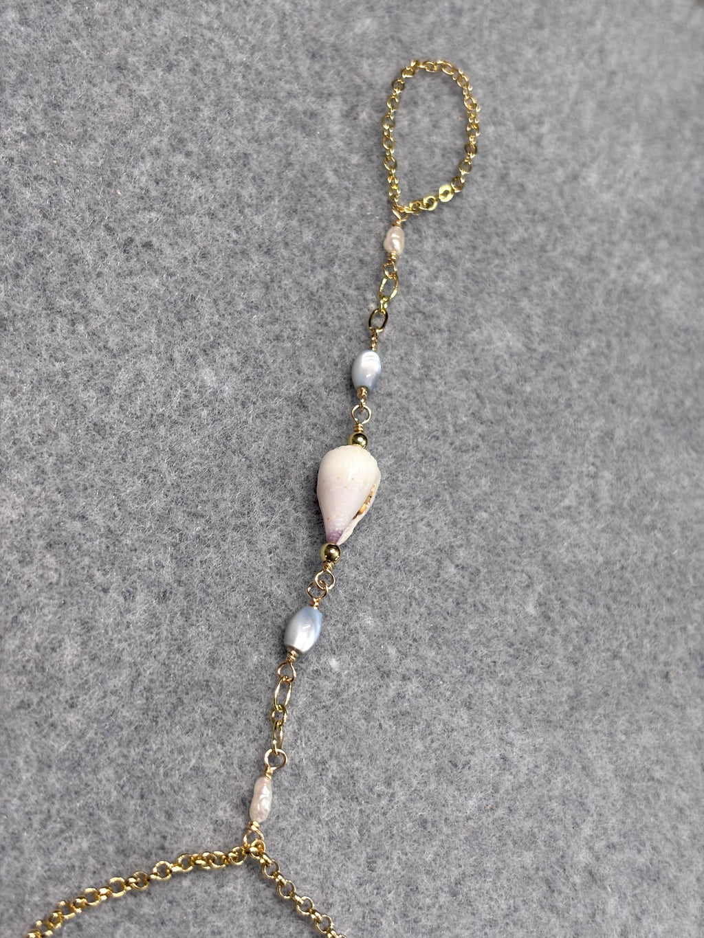 Cone shell handchain w/ white pearls and natural blue beads