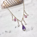 Purple cone shell charm Necklace w/ Pikake and white pearls