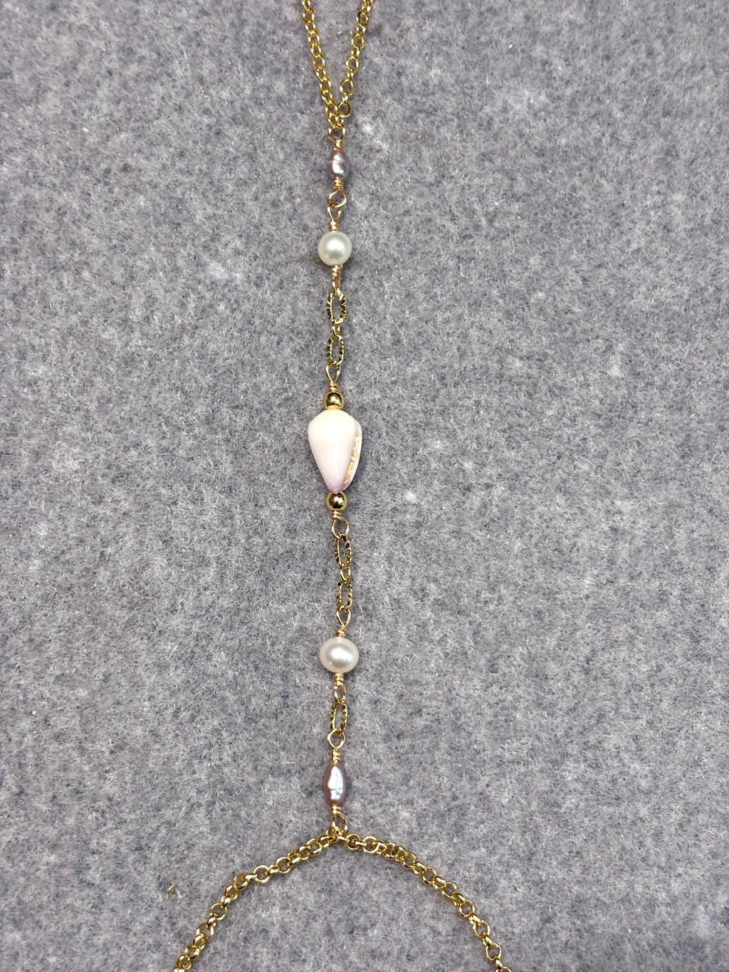 Cone shell handchain w/ white pearls