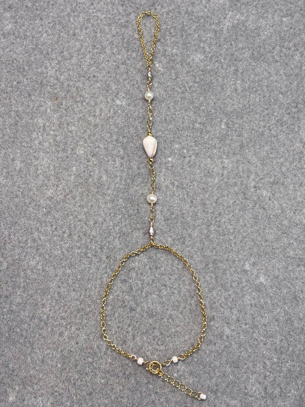 Cone shell handchain w/ white pearls