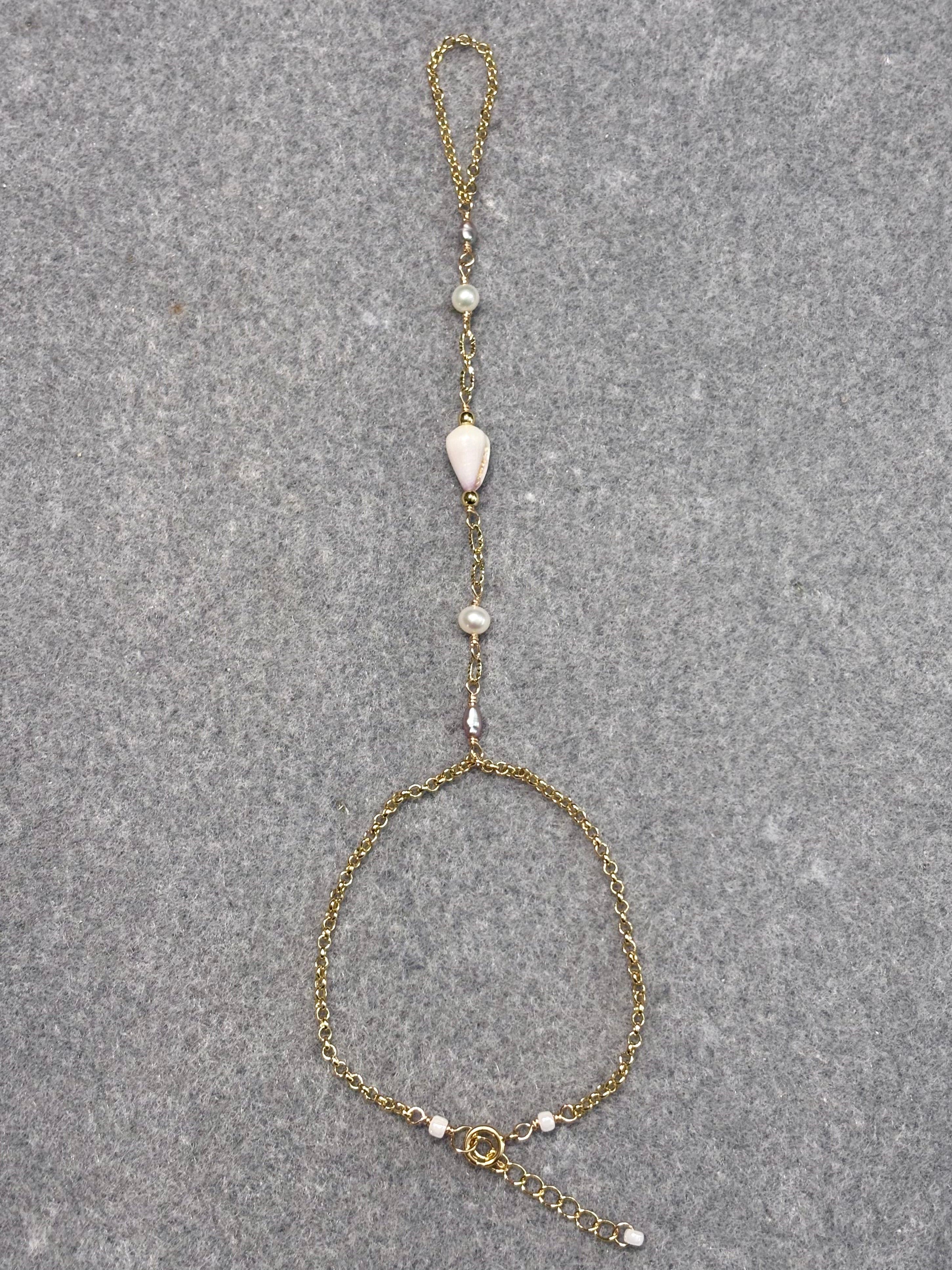 Cone shell handchain w/ white pearls