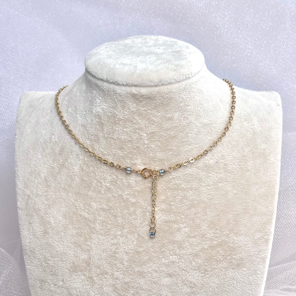 Calf cone shell Necklace w/ blue pearl