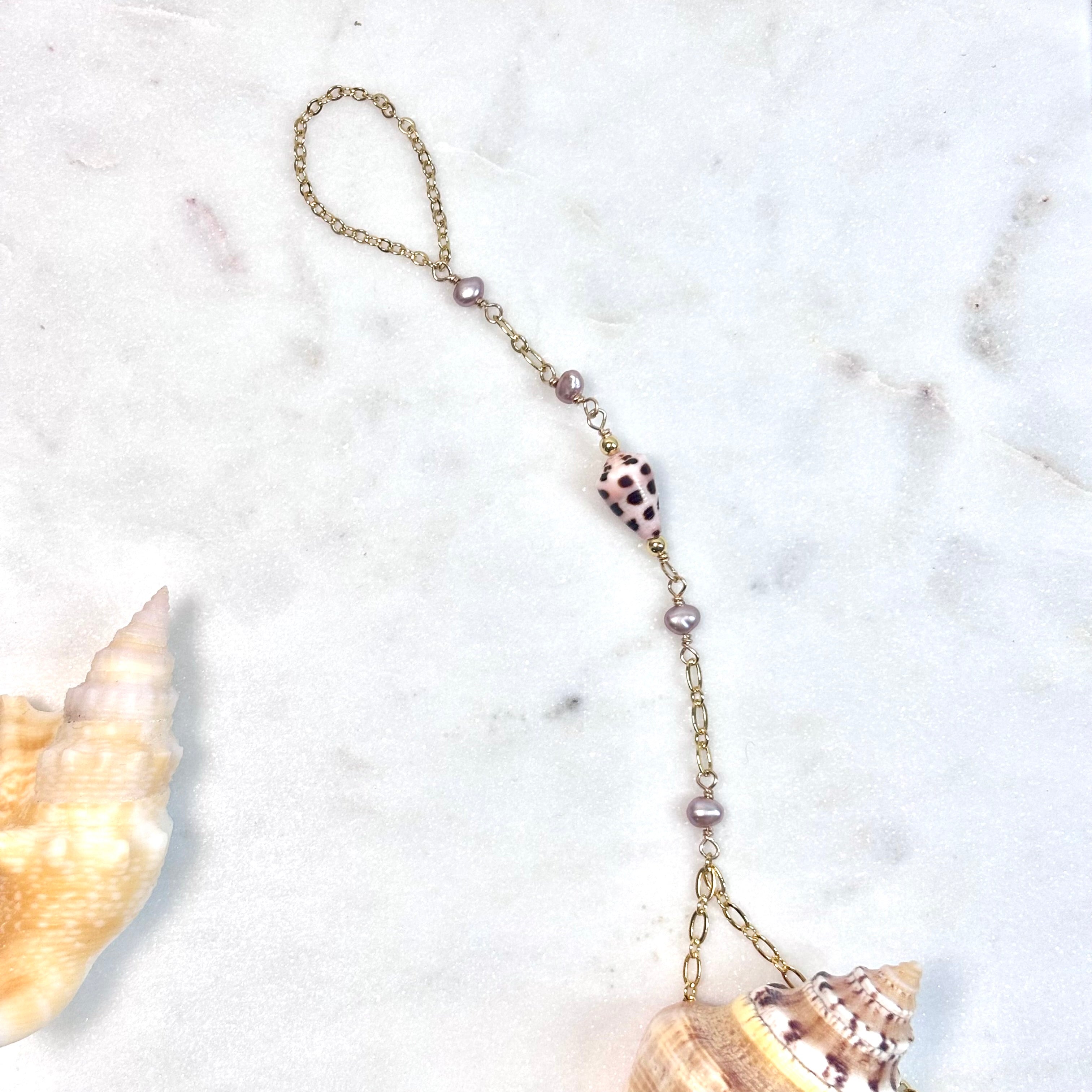 Hebrew cone shell handchain w/ pink pearls