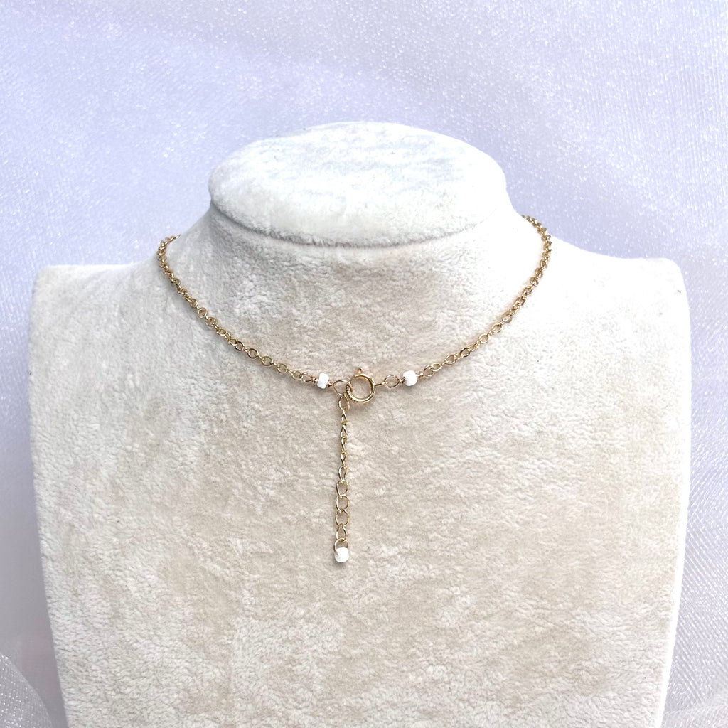 Abbreviated cone shell Necklace w/ white pearl