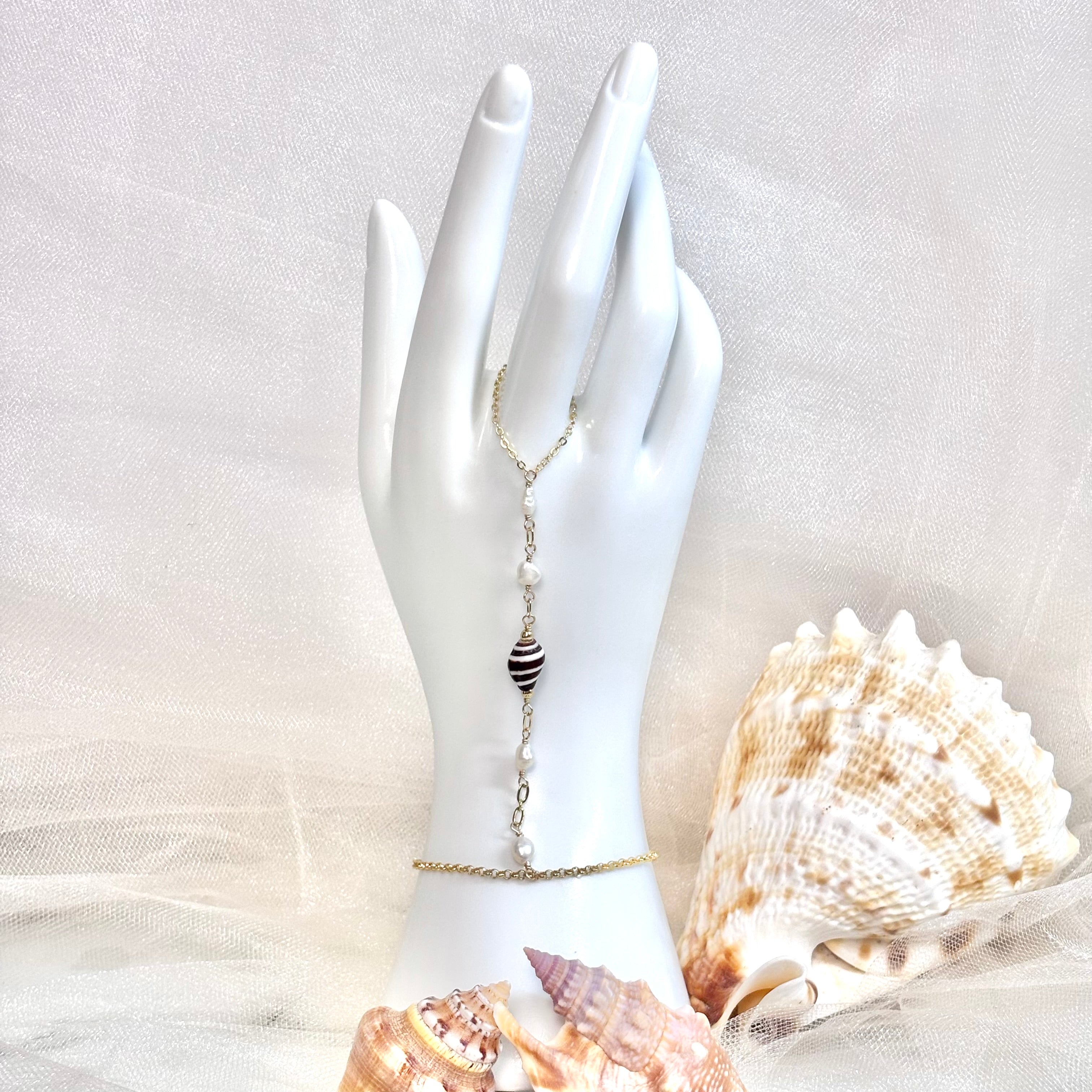 Bumblebee shell handchain w/ white pearls