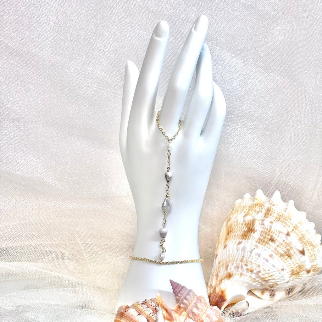 Cone shell handchain w/ light gray pearl