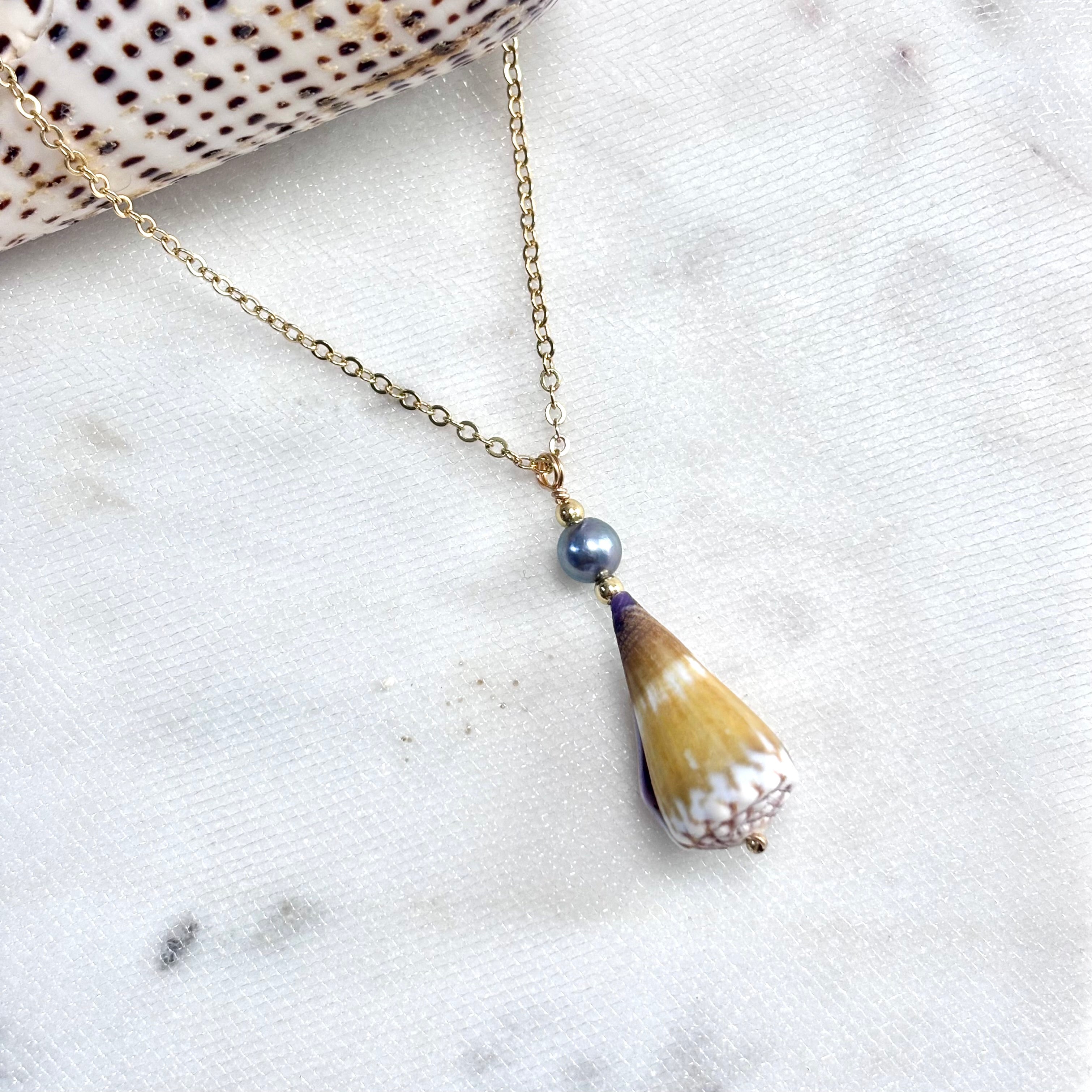 Calf cone shell Necklace w/ blue pearl