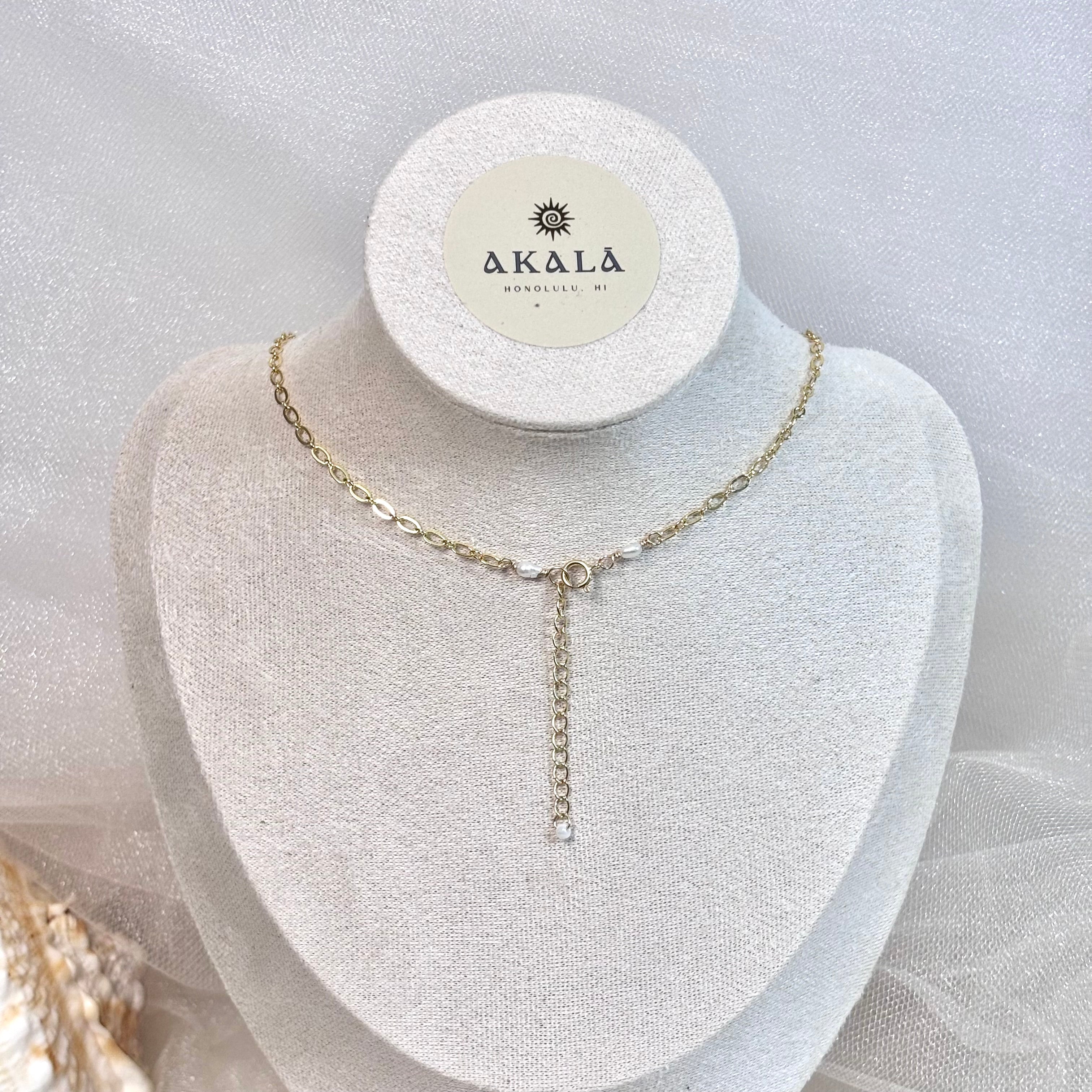 Multiple mini cone shell Necklace w/ Tahitian pearls