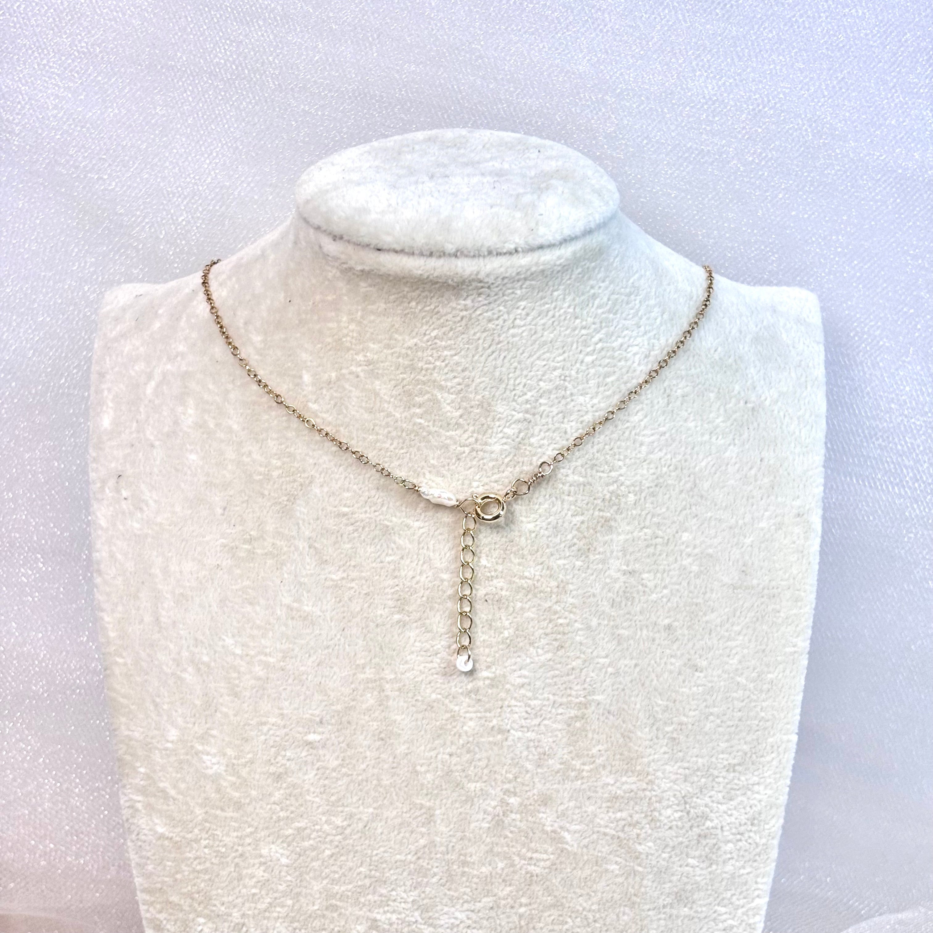 Hawaiian sunrise shell Necklace w/ Tahitian pearl and pikake