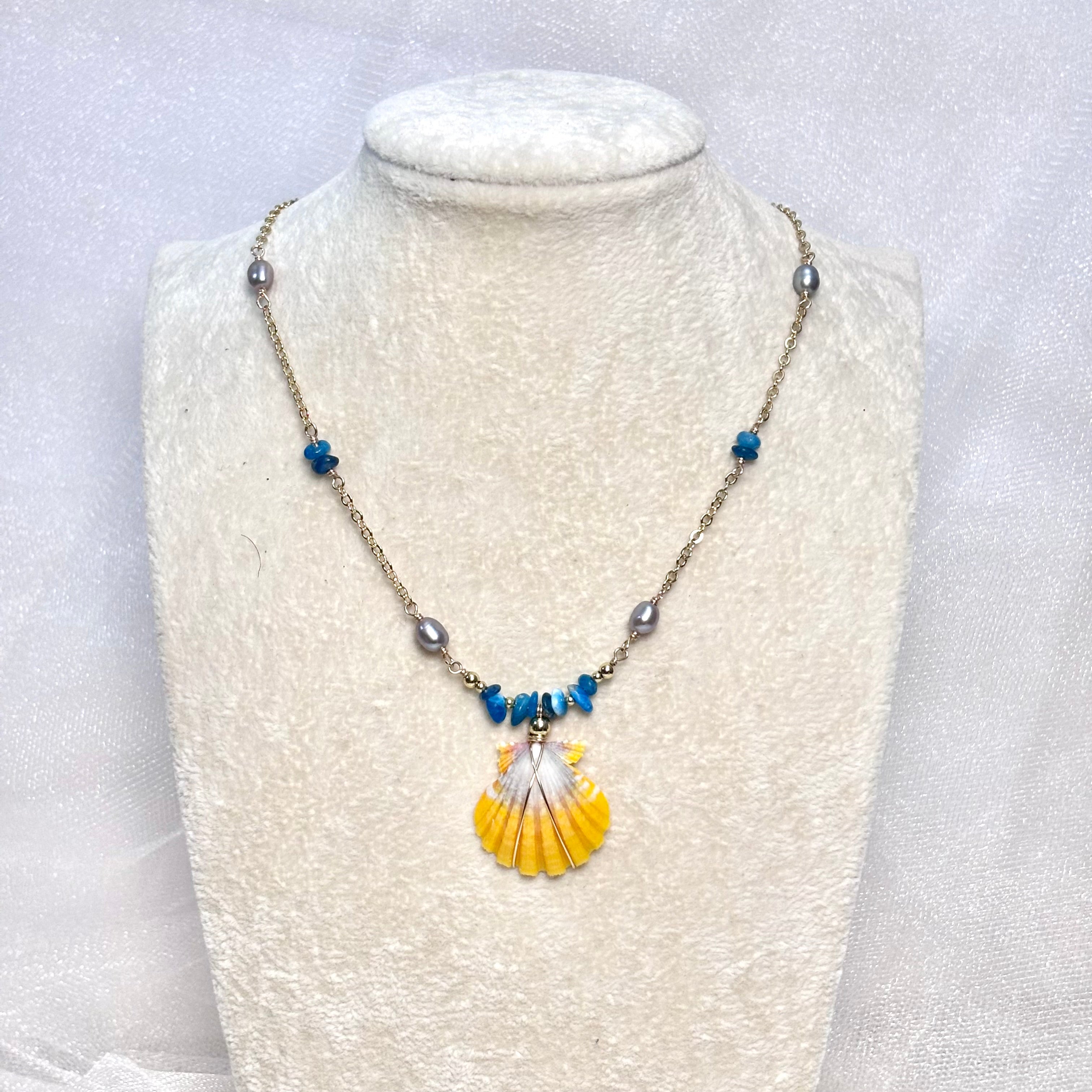 Hawaiian sunrise shell Necklace w/ pearls and ocean blue stone