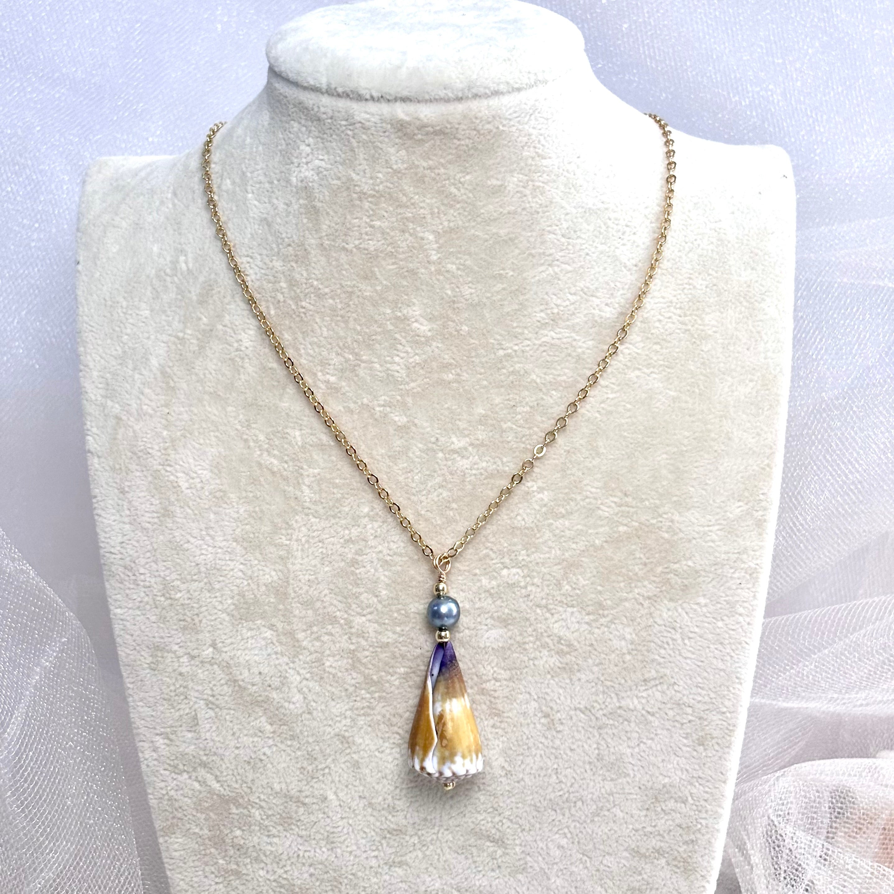 Calf cone shell Necklace w/ blue pearl