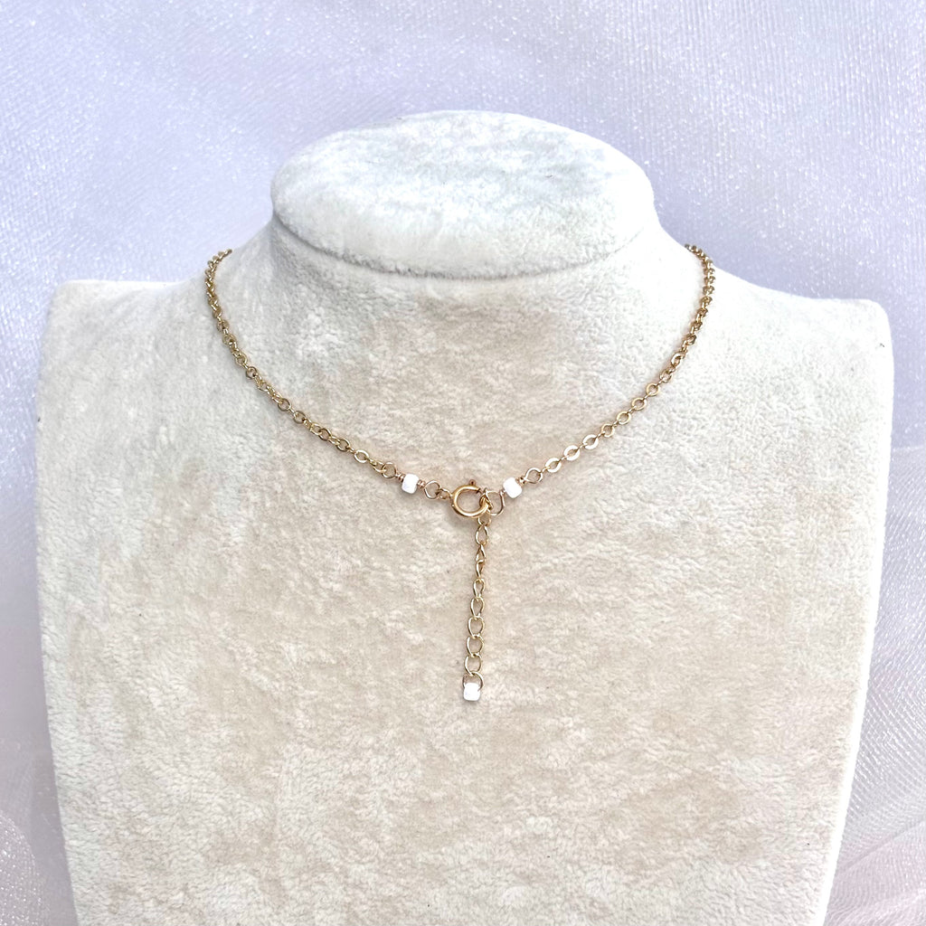 Abbreviated cone shell Necklace w/ Pikake