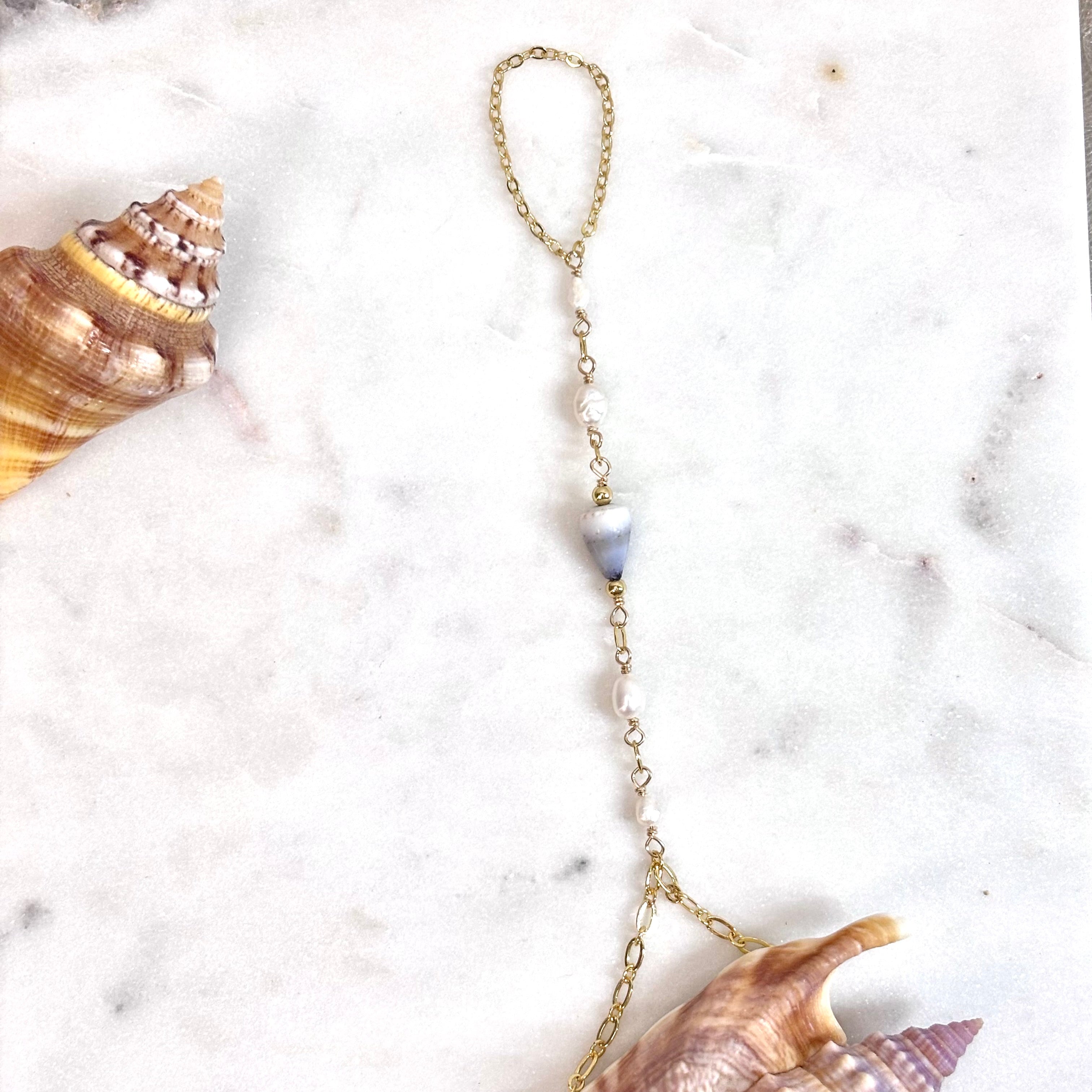 Cone shell handchain w/ white pearls