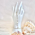 Pikake bead handchain w/ white pearls