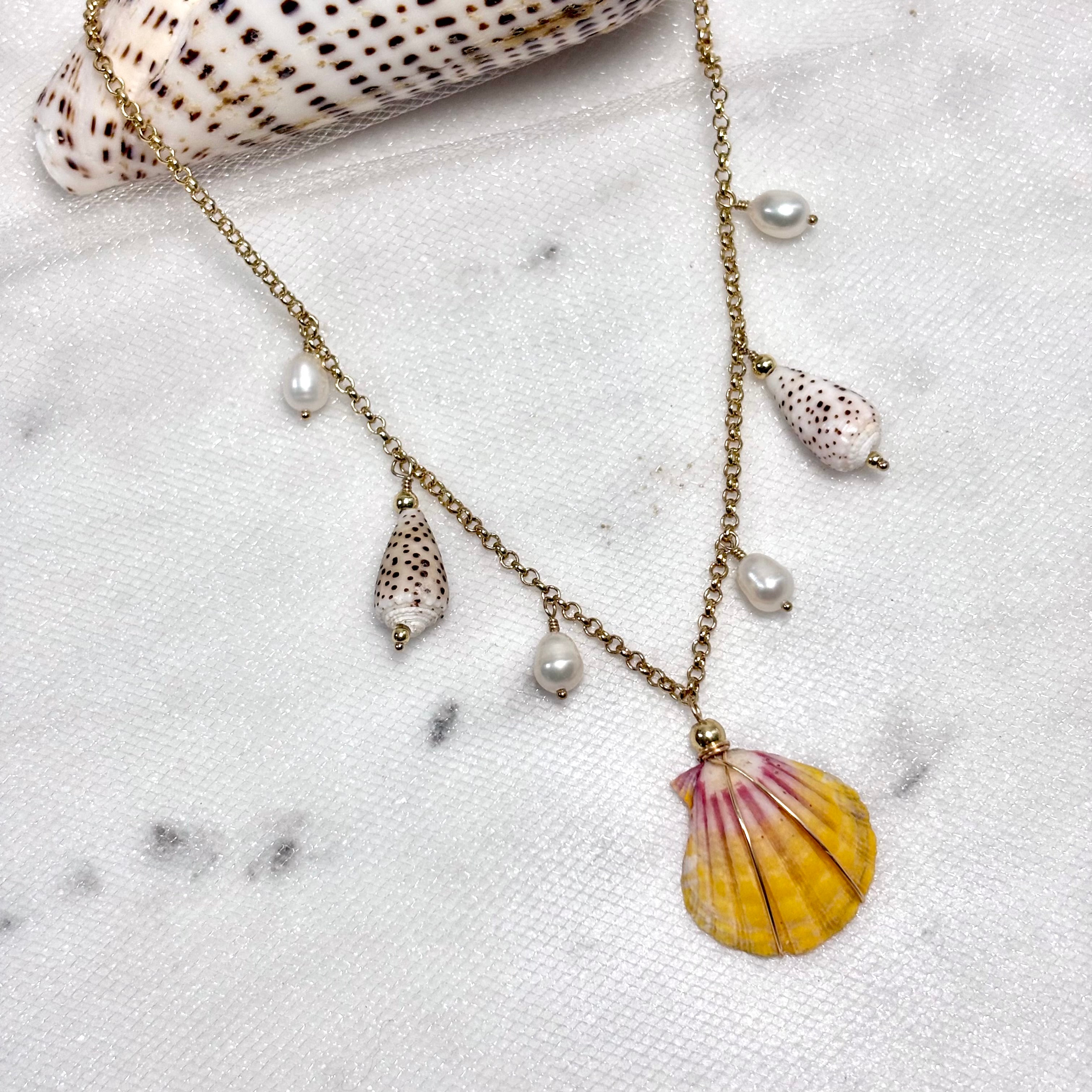 Hawaiian sunrise shell Necklace w/ flea cones and white pearls