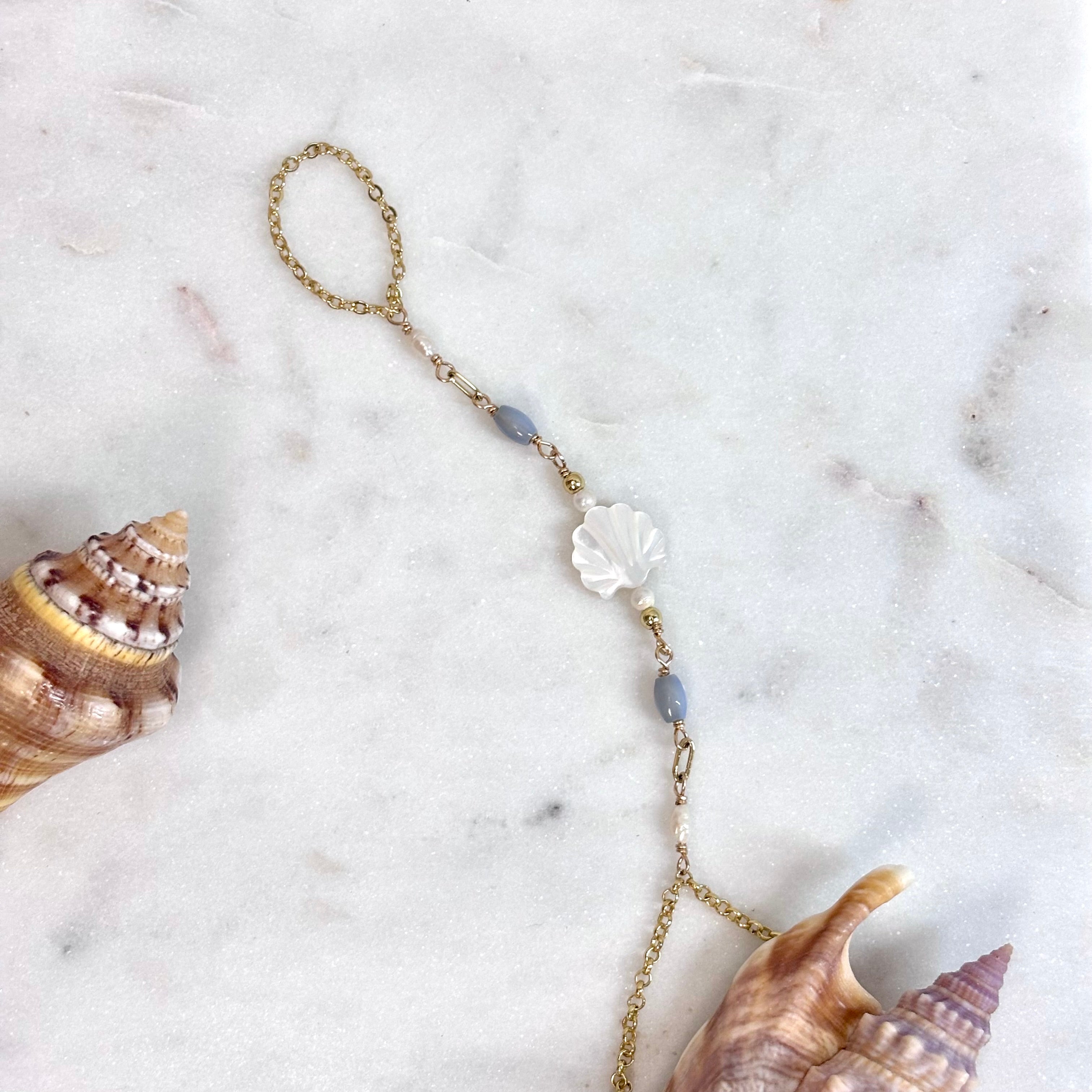 Shell bead handchain w/ white pearls